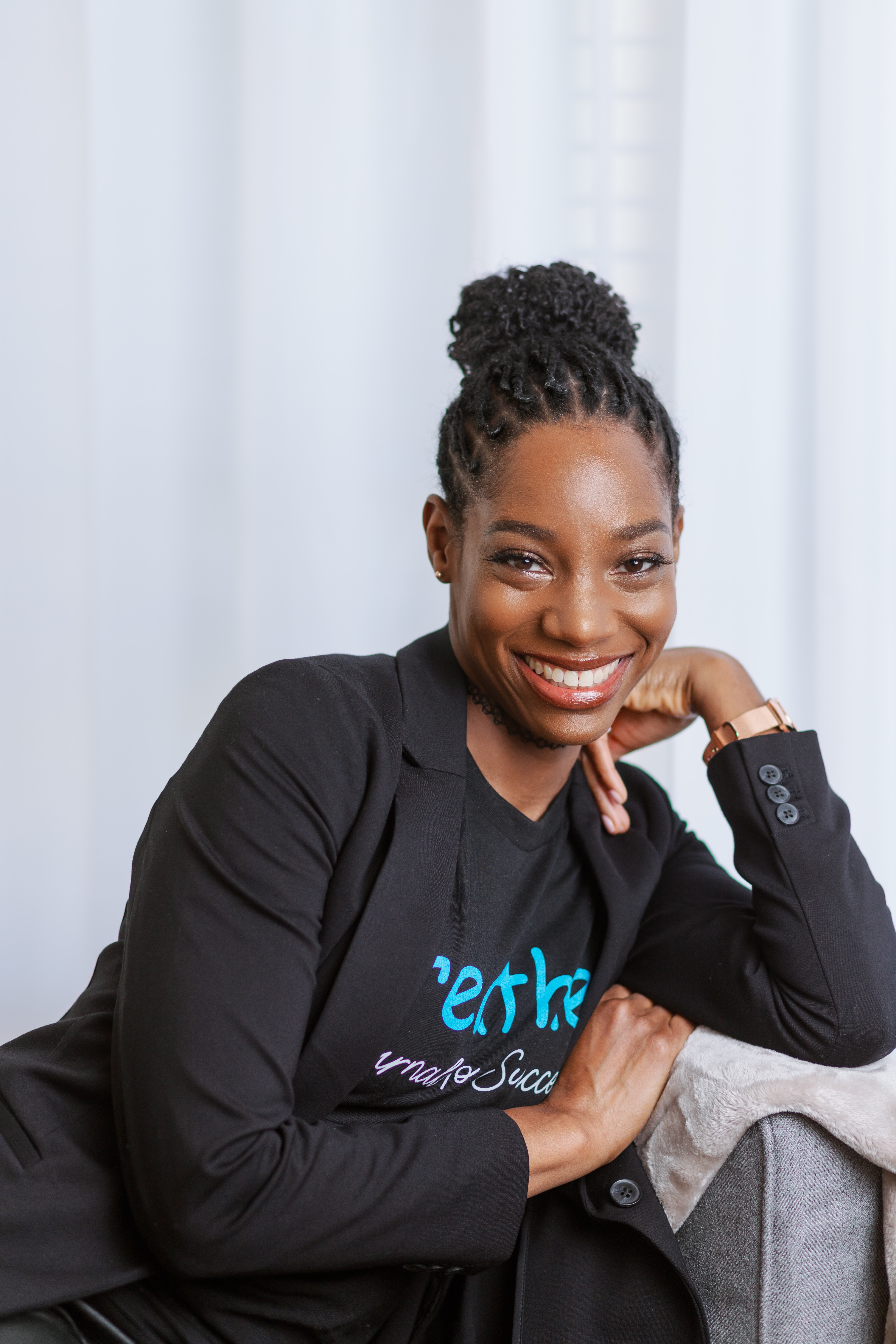 Jovana Scott, founder of breathe., in a warm editorial portrait
